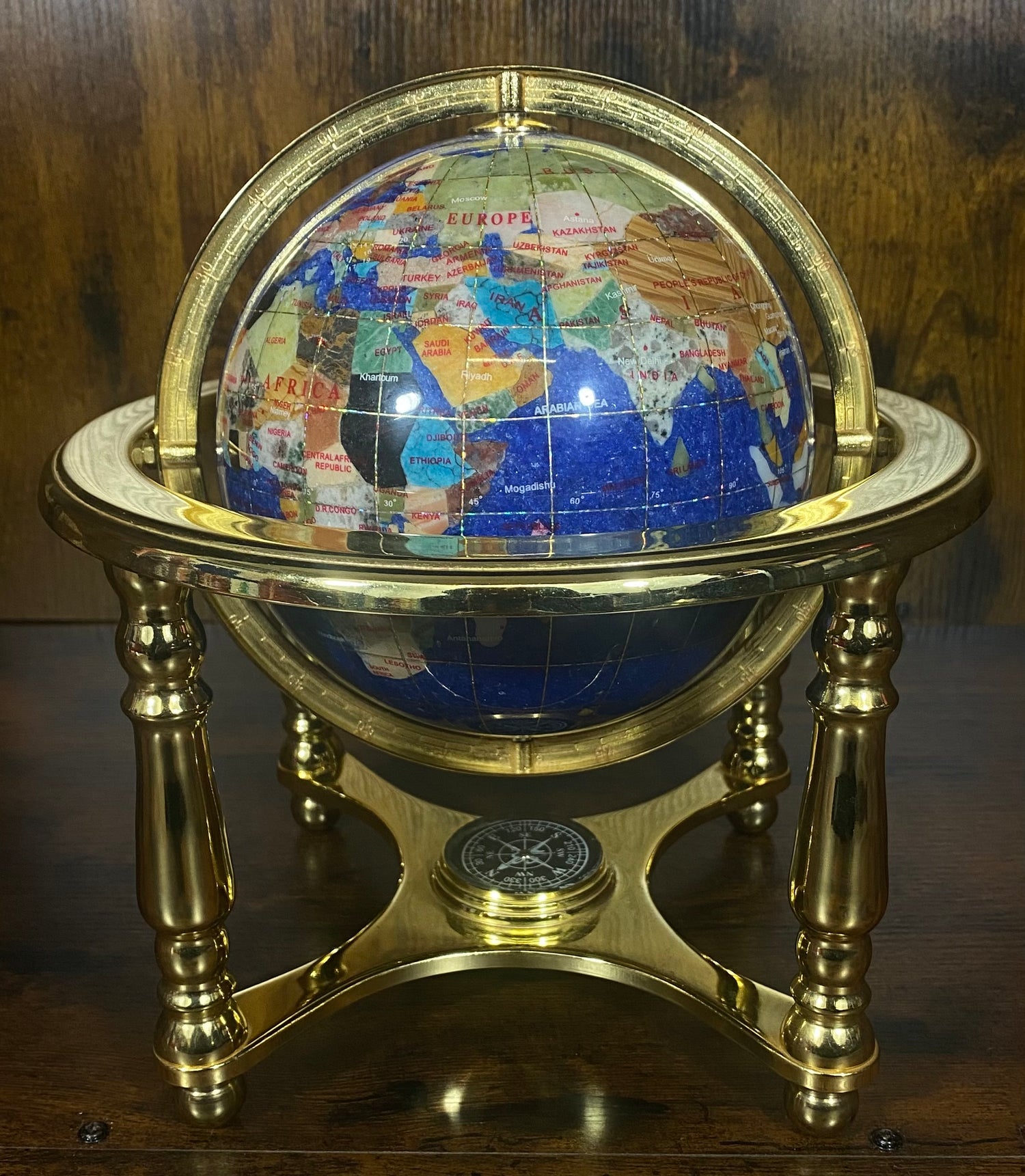 Dark Blue Gemstone Globe With Metallic Brass Cradle - Solid Colour