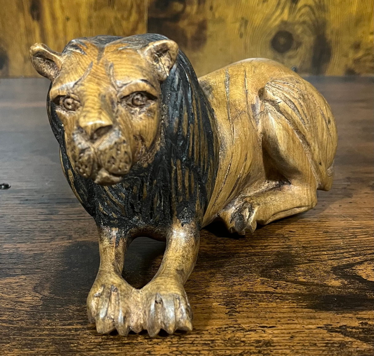 Ebony and Mahogany Resting Lion