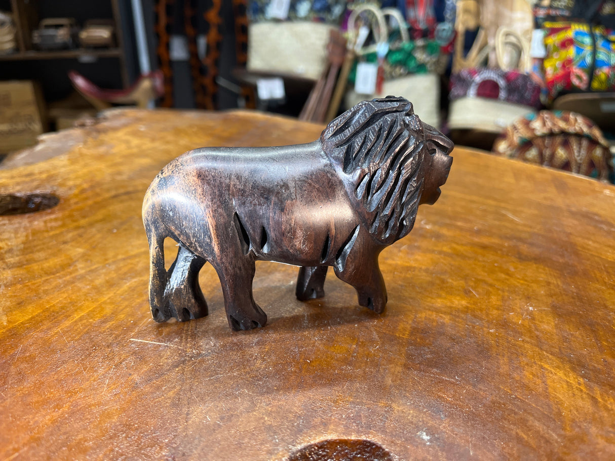 Beautiful In its own Right Hand Carved Dark Small Lion