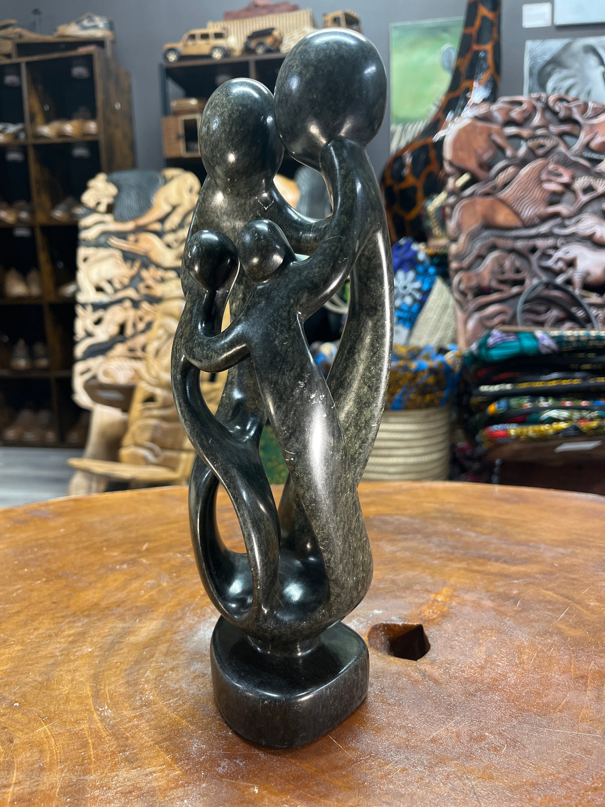 Hand Carved Stunning Green Stone Abstract Sculpture - Parents and Two Children (Dark - Wide)