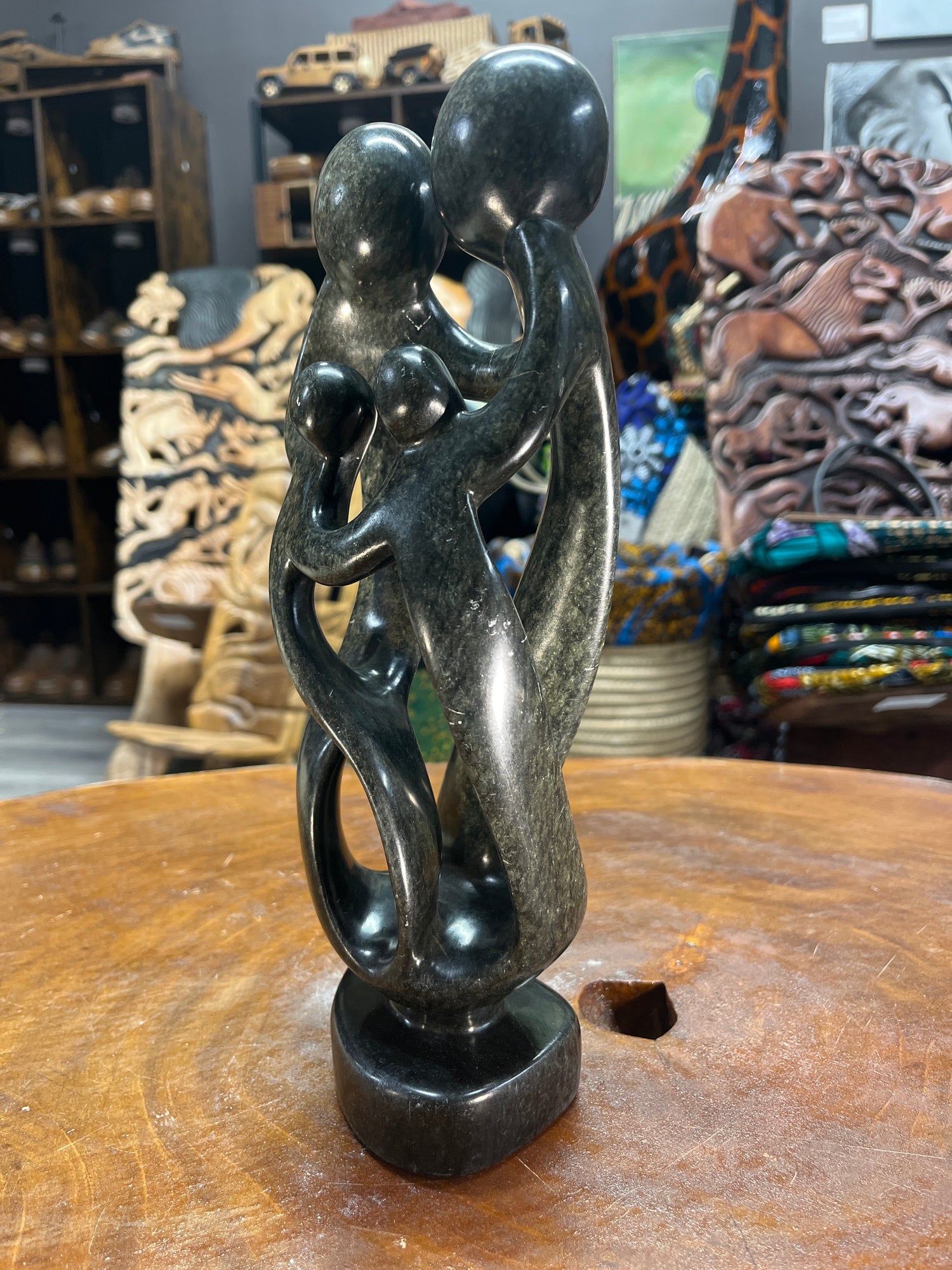 Hand Carved Stunning Green Stone Abstract Sculpture - Parents and Two Children (Dark - Wide)