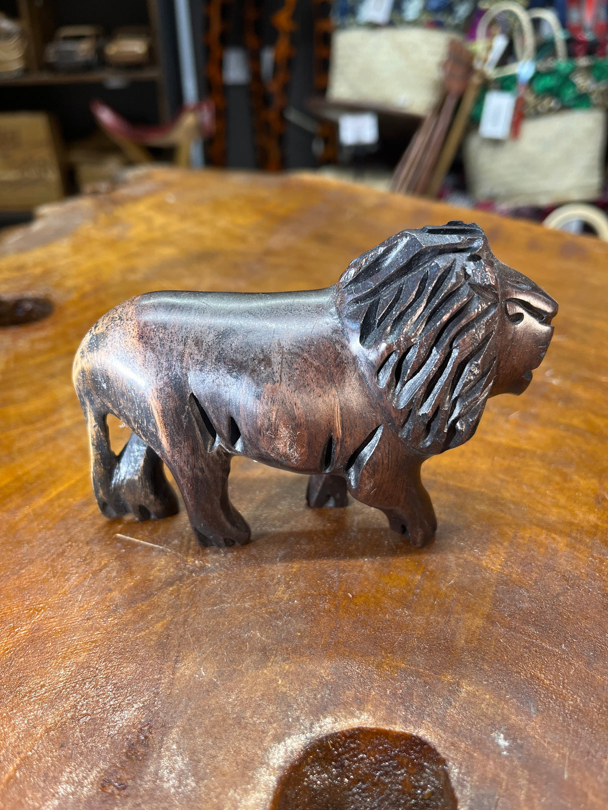 Beautiful In its own Right Hand Carved Dark Small Lion