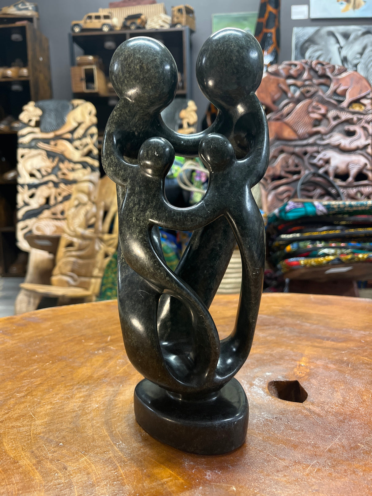 Hand Carved Stunning Green Stone Abstract Sculpture - Parents and Two Children (Dark - Wide)