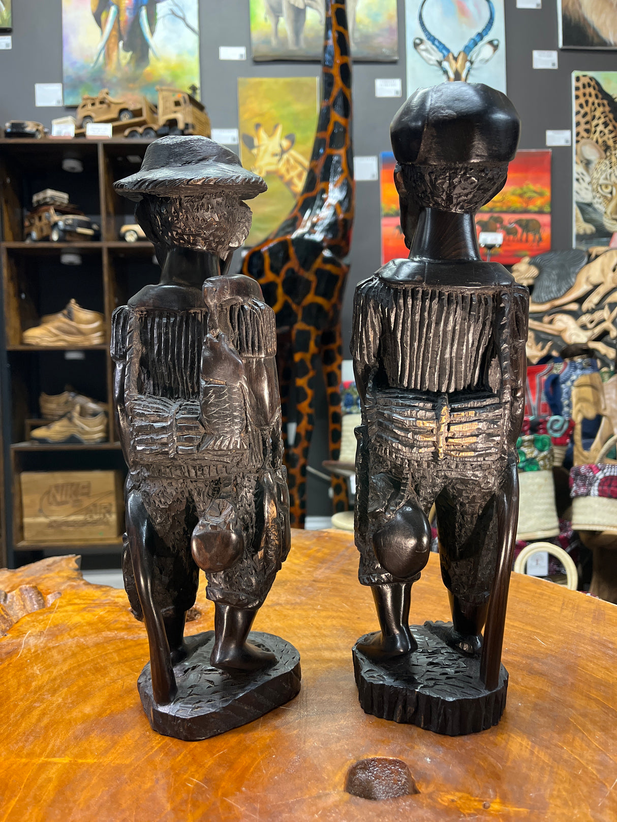Pair of Ebony Hand Carved Fisherman