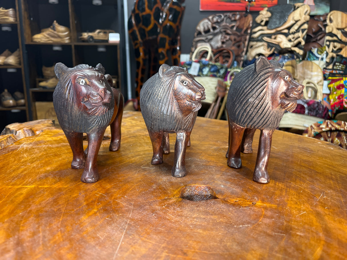 Dark Red / Brown Wooden Hand Carved Lions - Stunning Facial Features and Realism