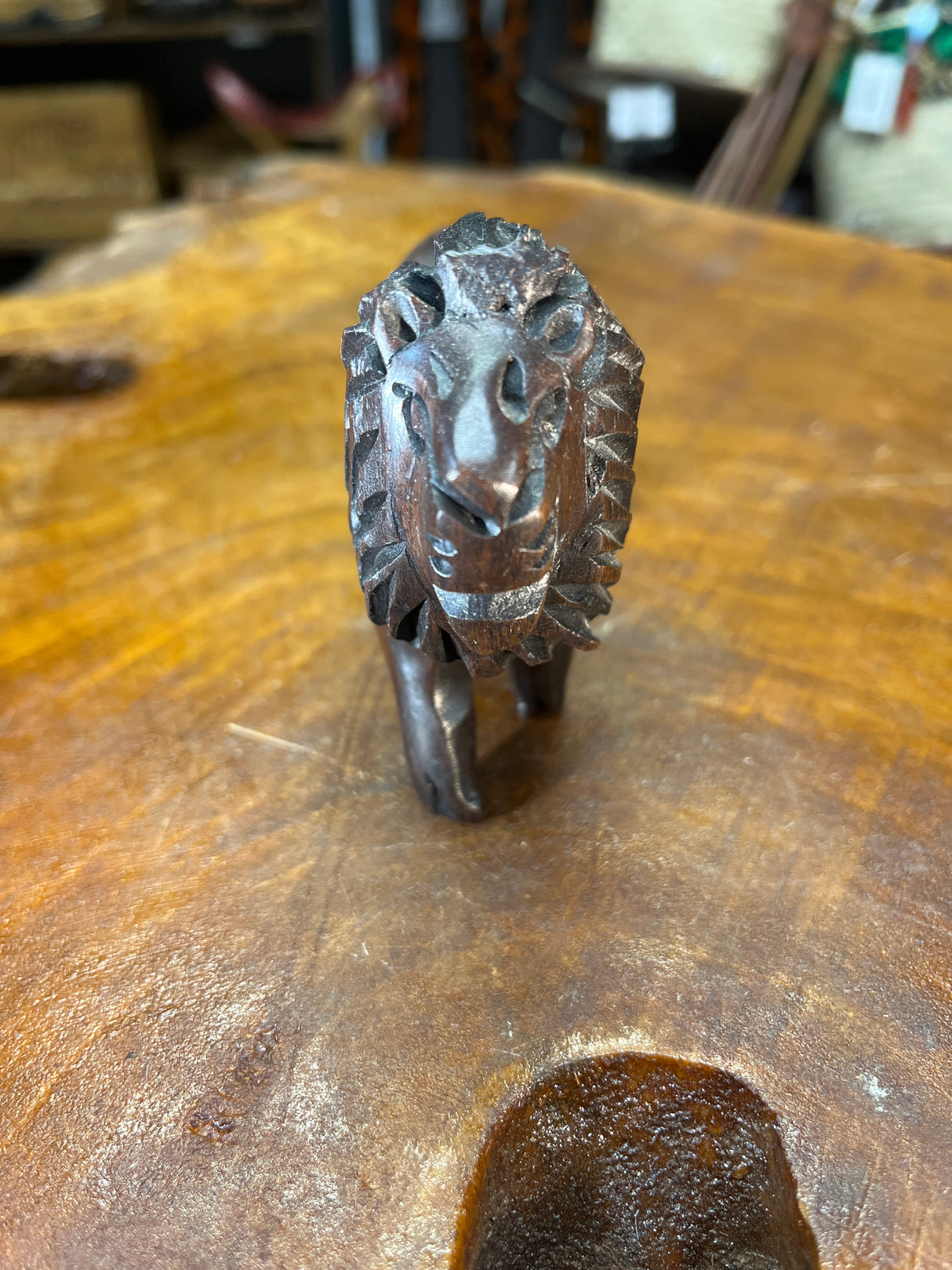Beautiful In its own Right Hand Carved Dark Small Lion