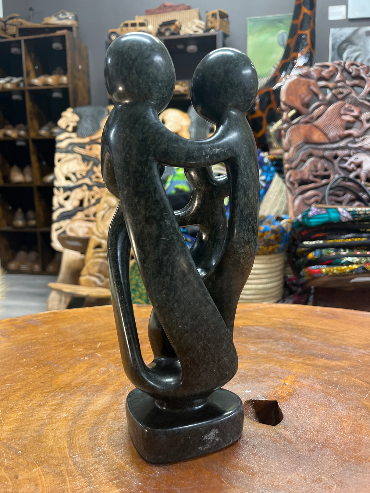 Hand Carved Stunning Green Stone Abstract Sculpture - Parents and Two Children (Dark - Wide)