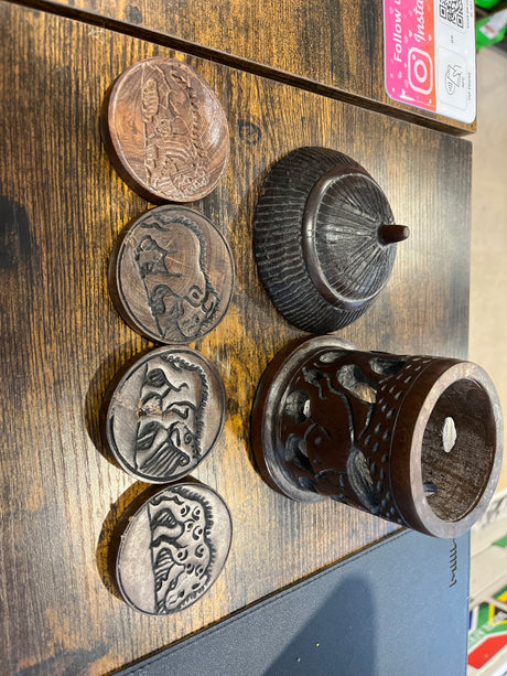 Hand Carved Ebony African Hut with Rhino and Elephant Design Coaster Set with 4 Coasters