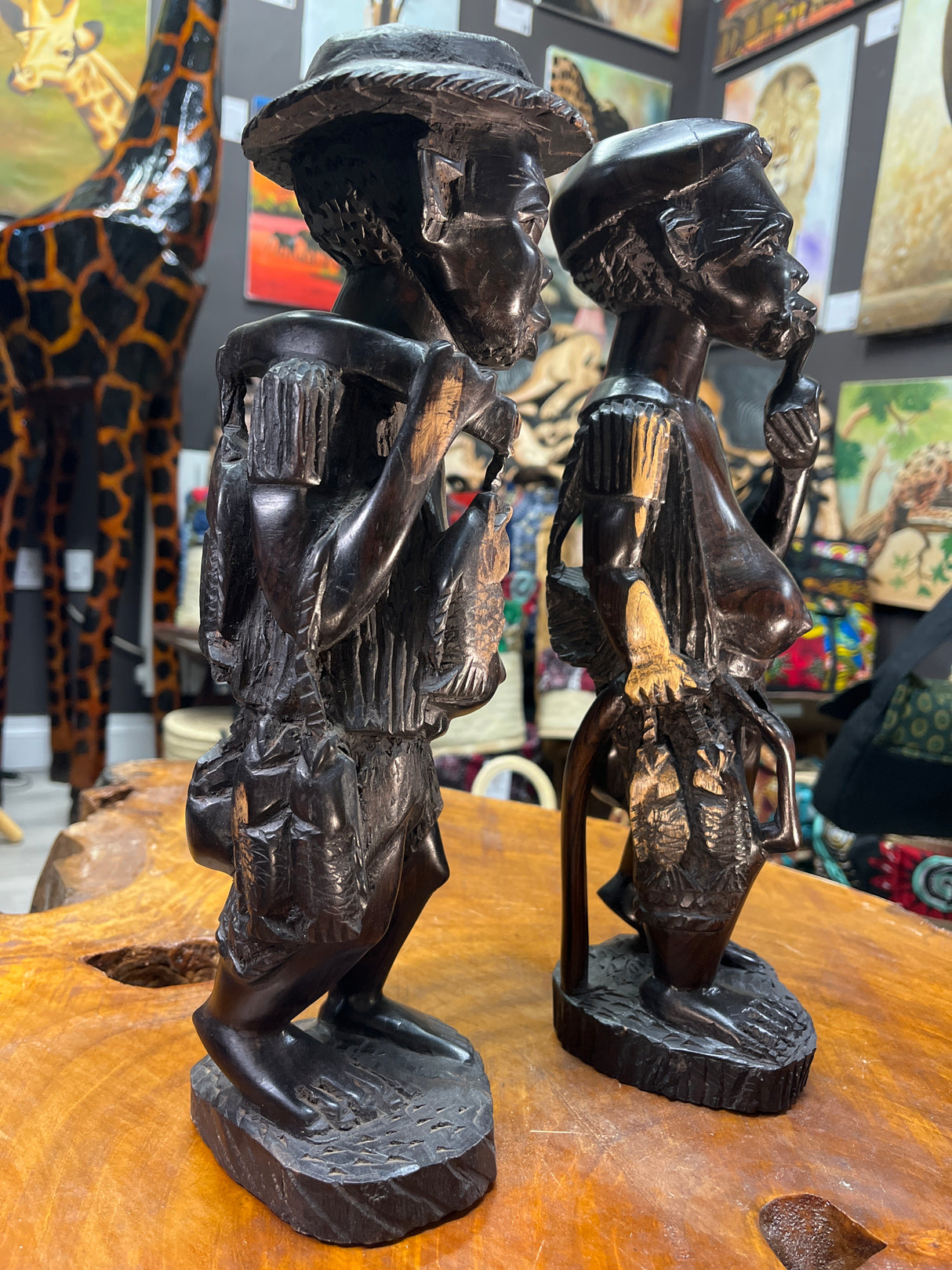 Pair of Ebony Hand Carved Fisherman