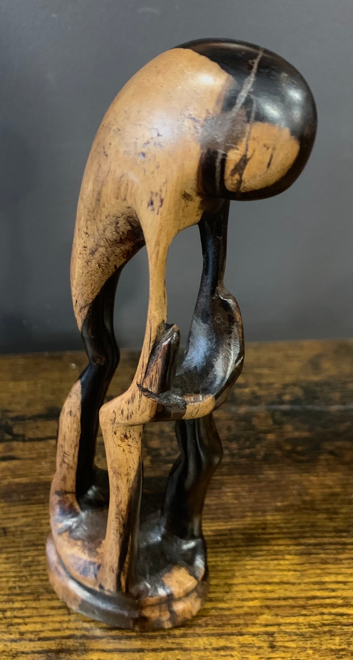 Wooden Mother Breaking Up a Fight Between Siblings