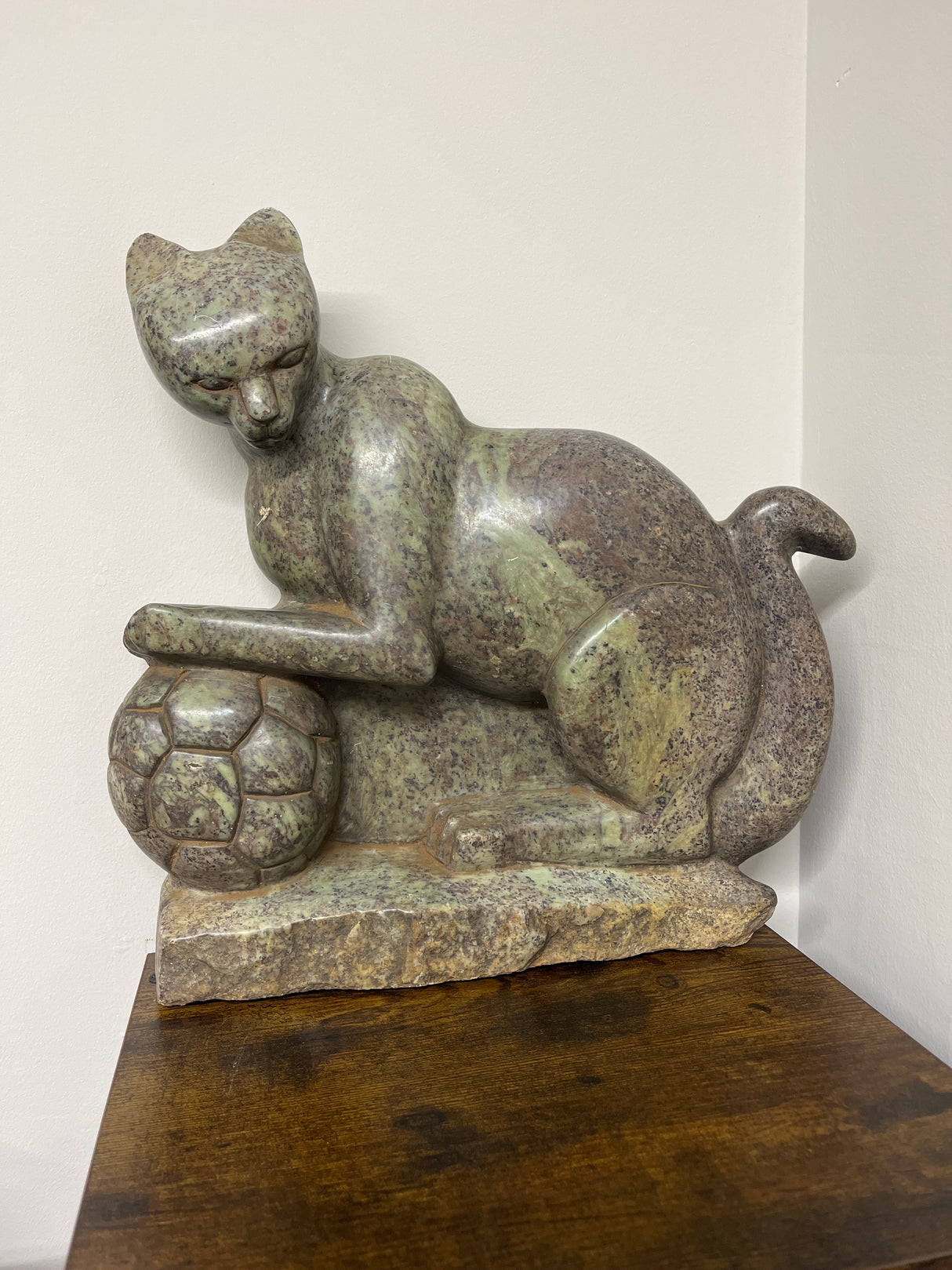 Green Stone Panther Playing with a Football