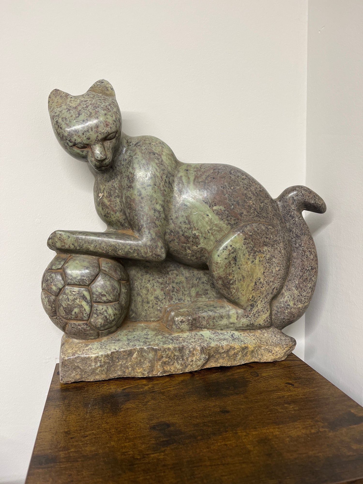Green Stone Panther Playing with a Football