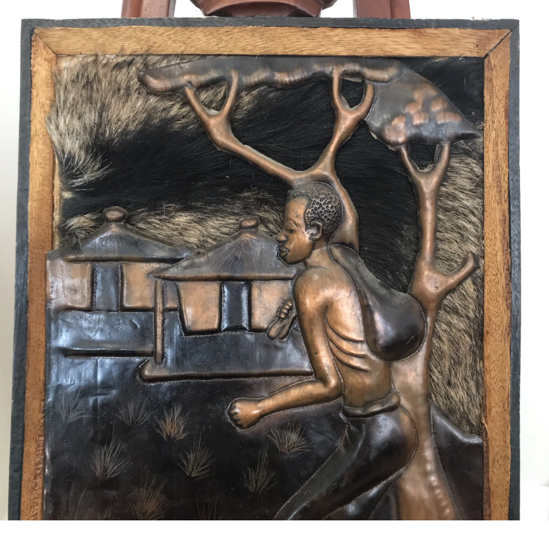 African Man Walking to Work In Copper Frame