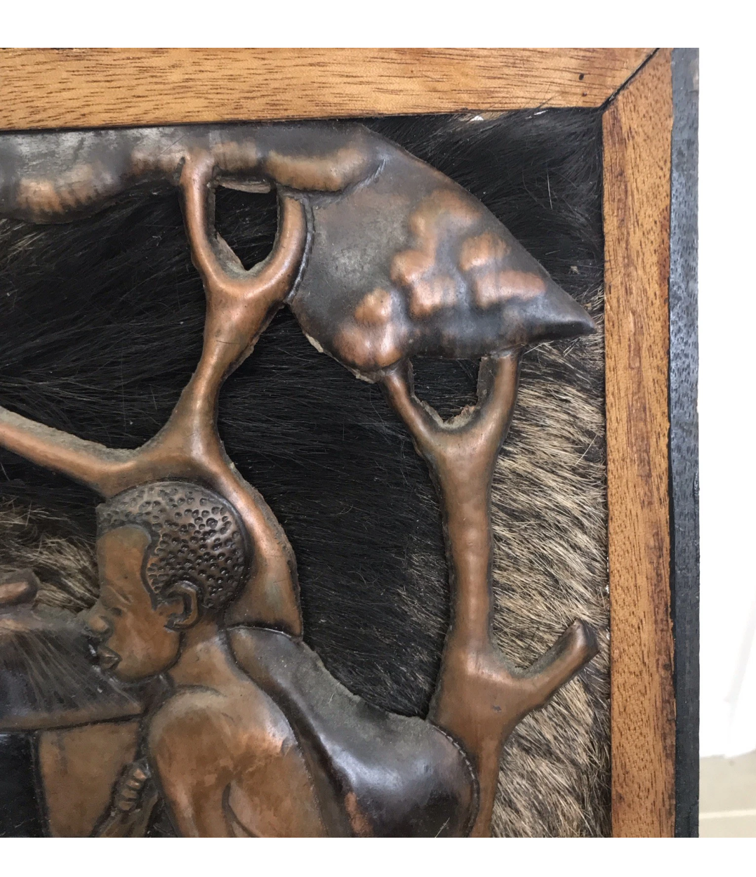 African Man Walking to Work In Copper Frame