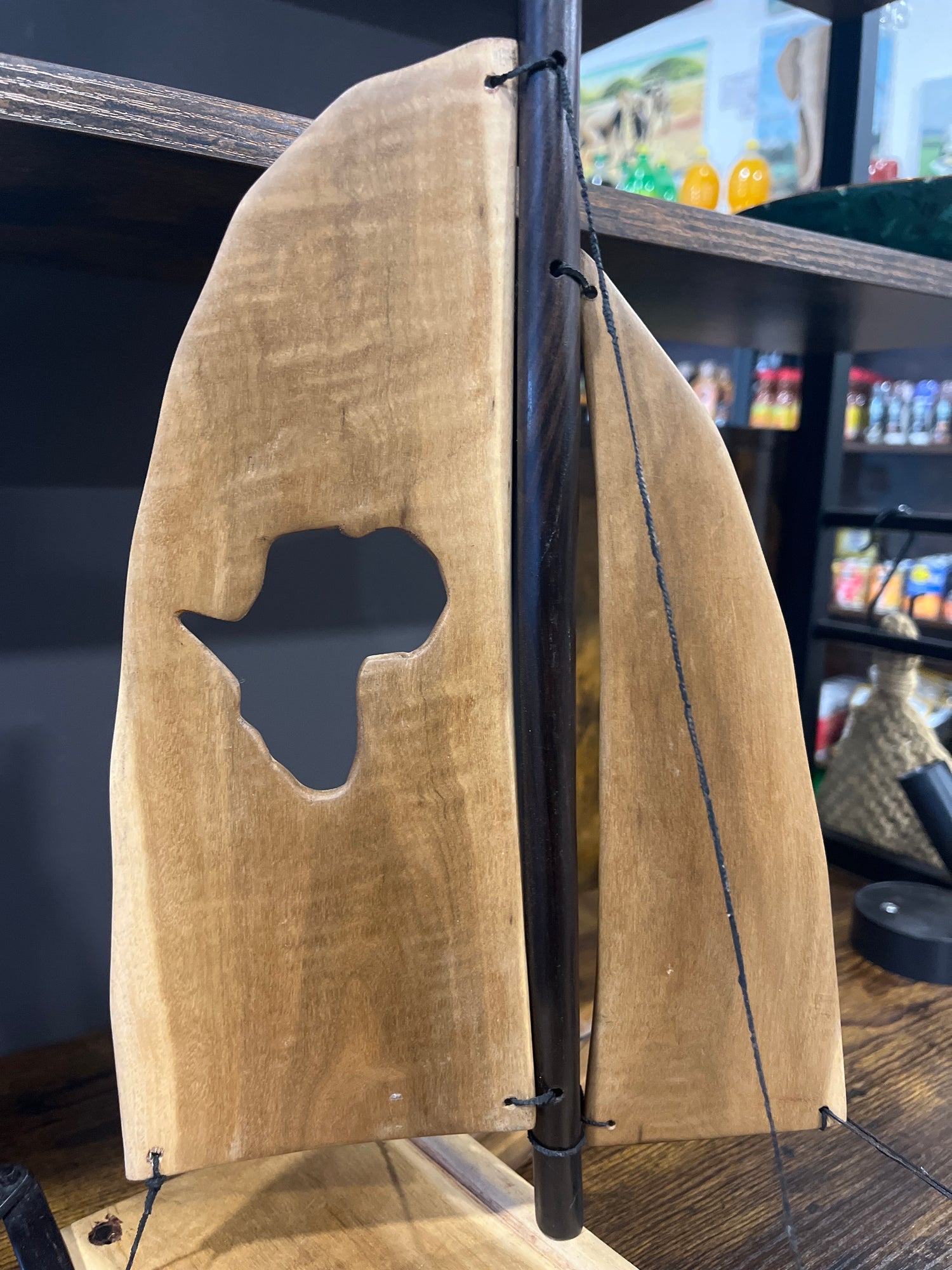 Intricately Hand Carved Wooden Catamaran with ‘Africa’ Sail