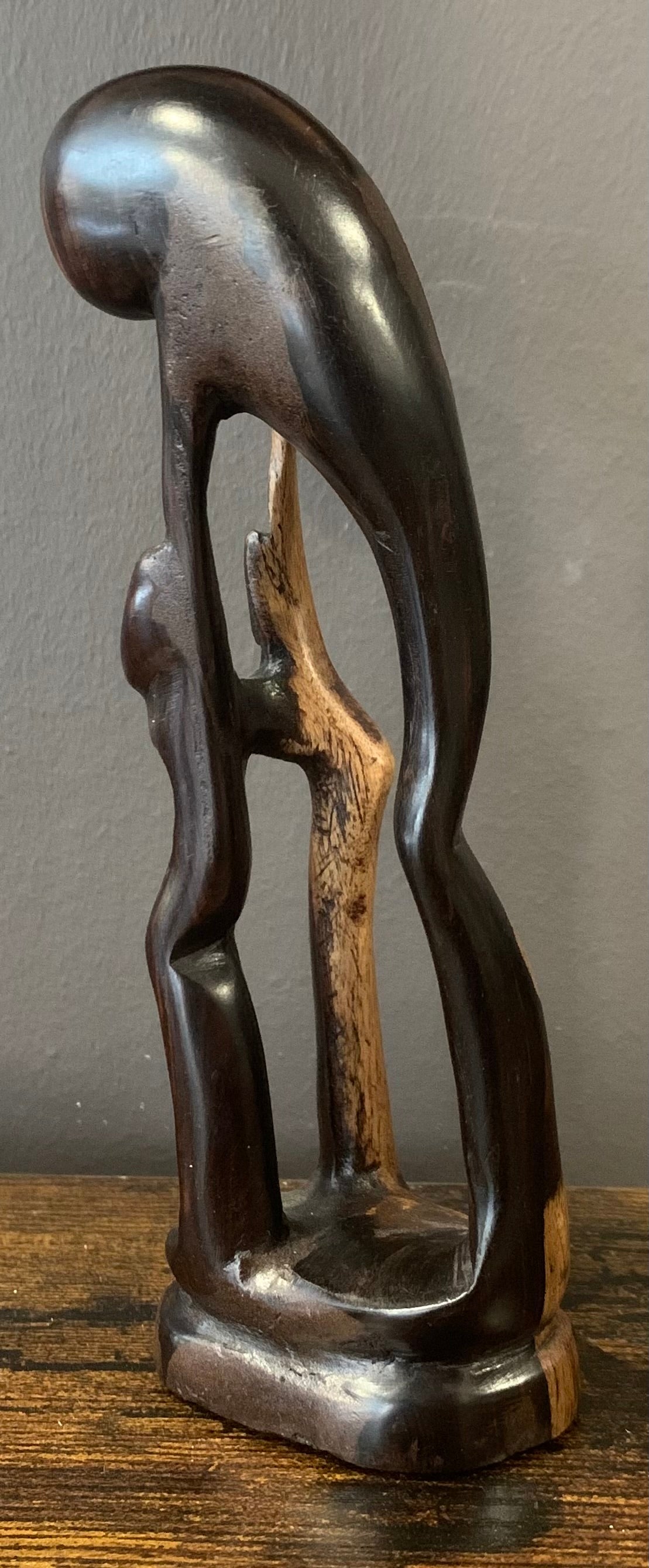 Wooden Mother Breaking Up a Fight Between Siblings
