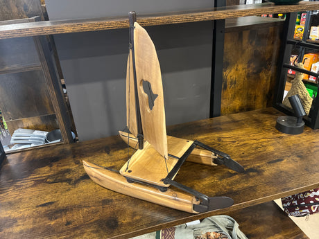 Intricately Hand Carved Wooden Catamaran with ‘Africa’ Sail
