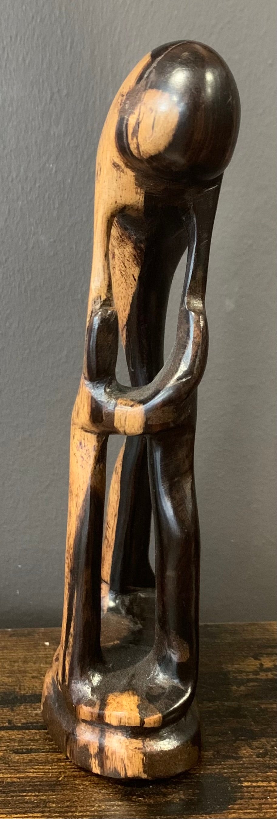 Wooden Mother Breaking Up a Fight Between Siblings
