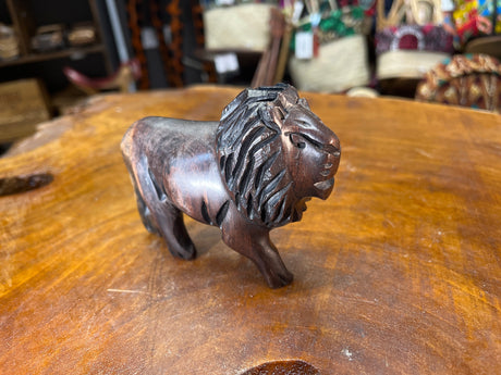 Beautiful In its own Right Hand Carved Dark Small Lion