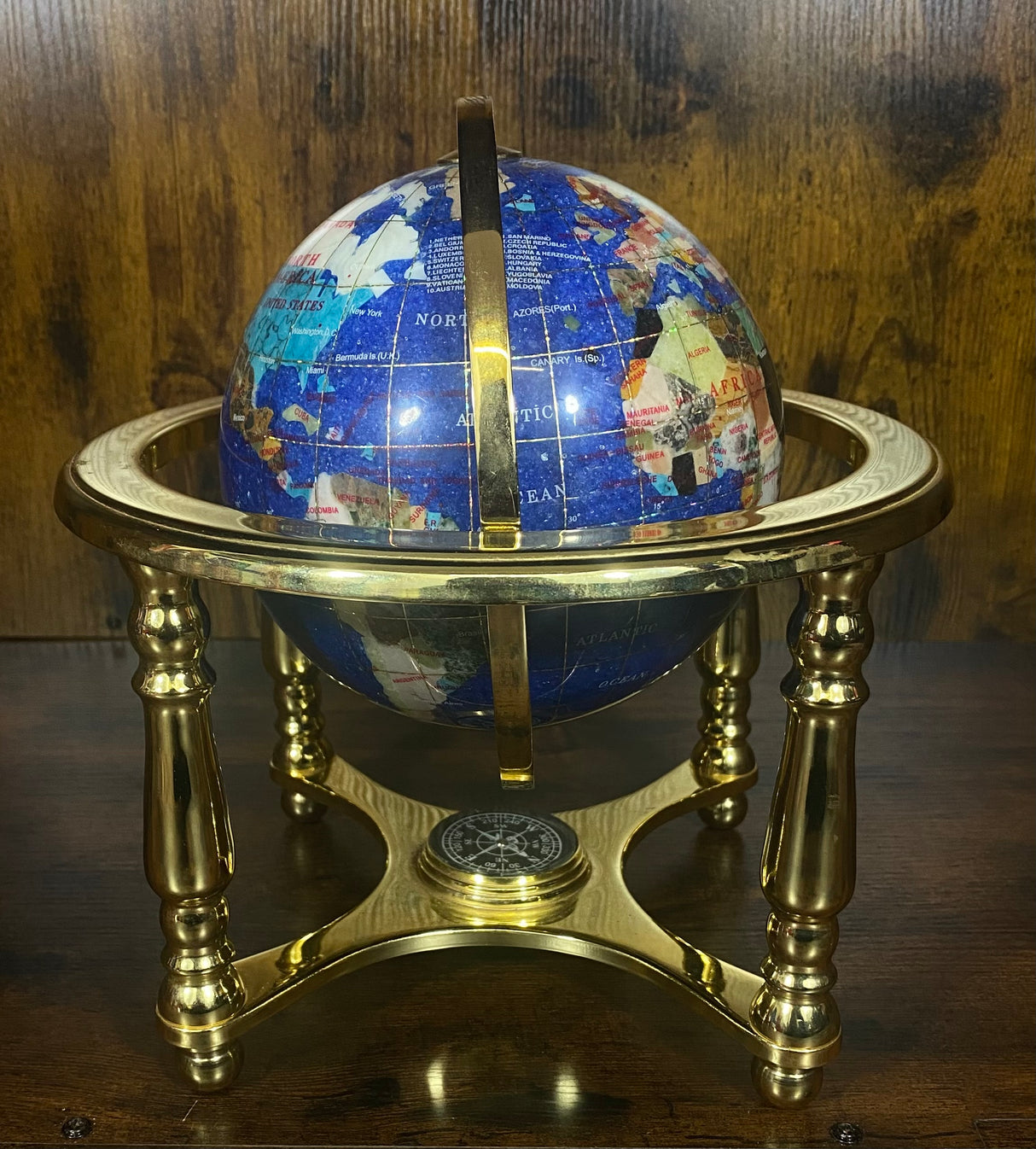 Dark Blue Gemstone Globe With Metallic Brass Cradle - Solid Colour