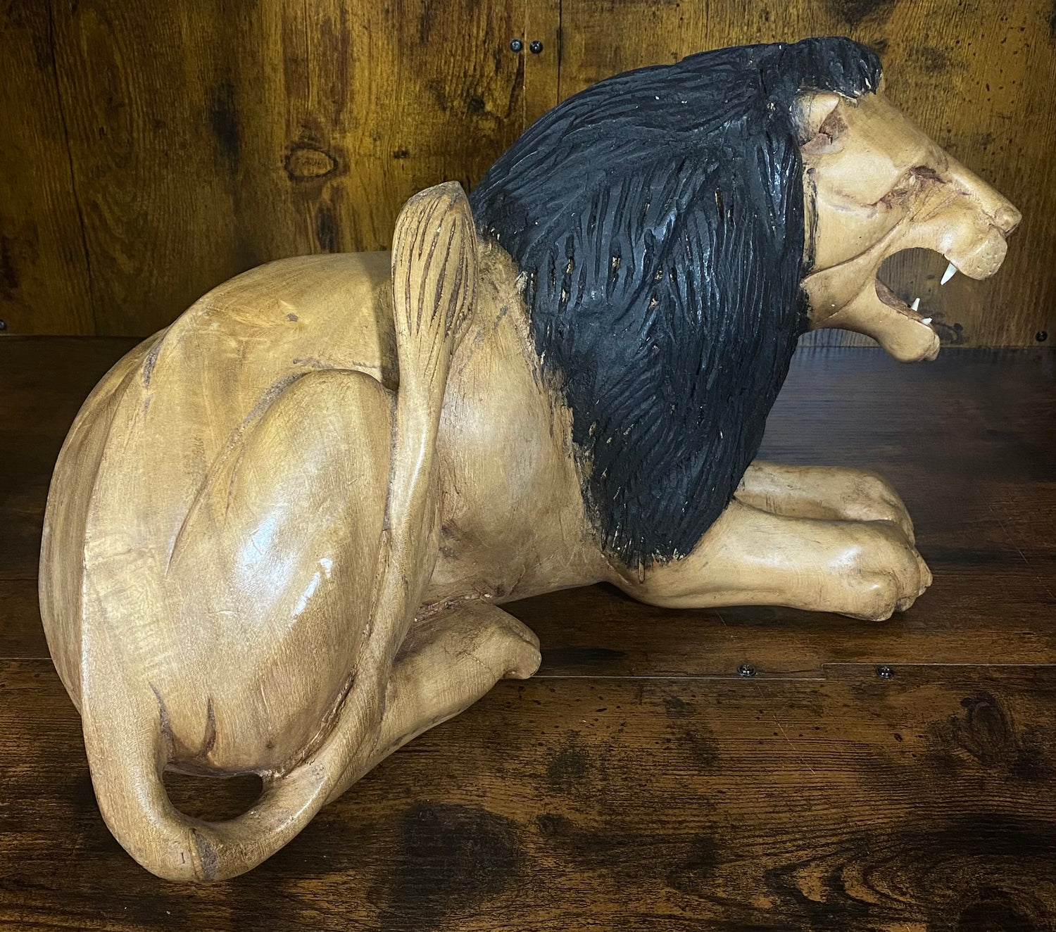 Hand Carved Resting Lion with a Warning Growl