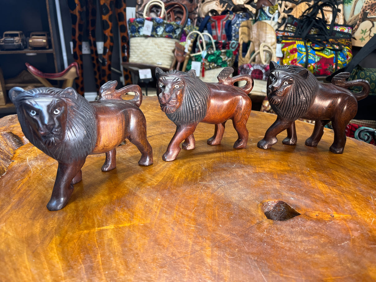 Dark Red / Brown Wooden Hand Carved Lions - Stunning Facial Features and Realism