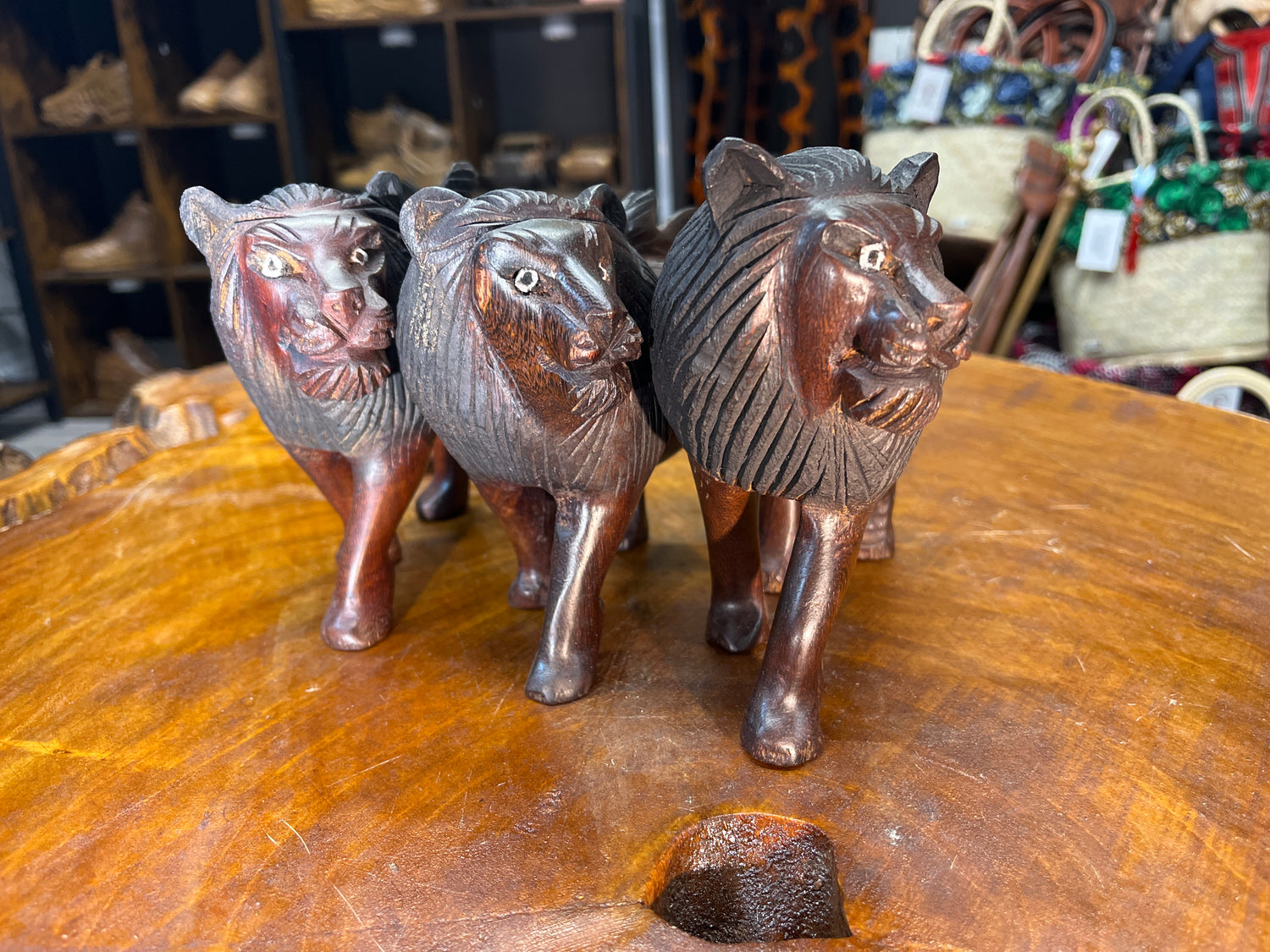 Dark Red / Brown Wooden Hand Carved Lions - Stunning Facial Features and Realism