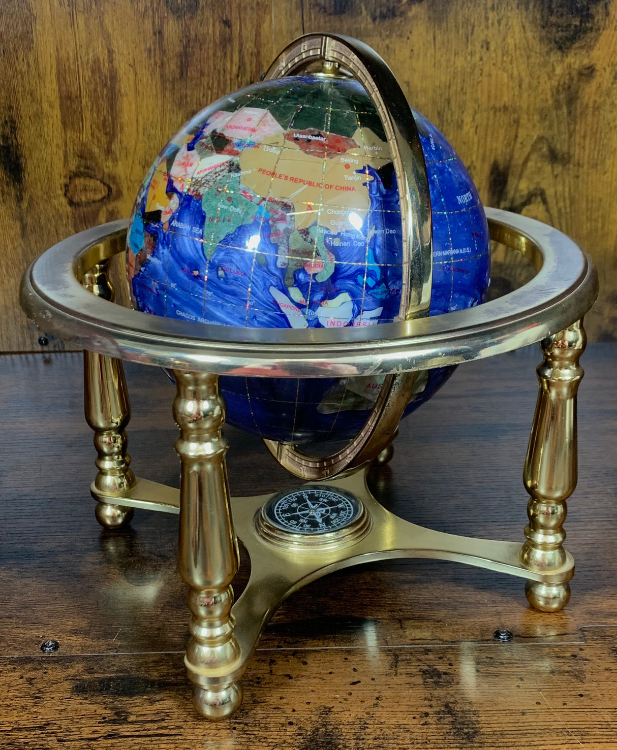 Dark Blue Gemstone Globe With Metallic Brass Cradle - Swirl Pattern