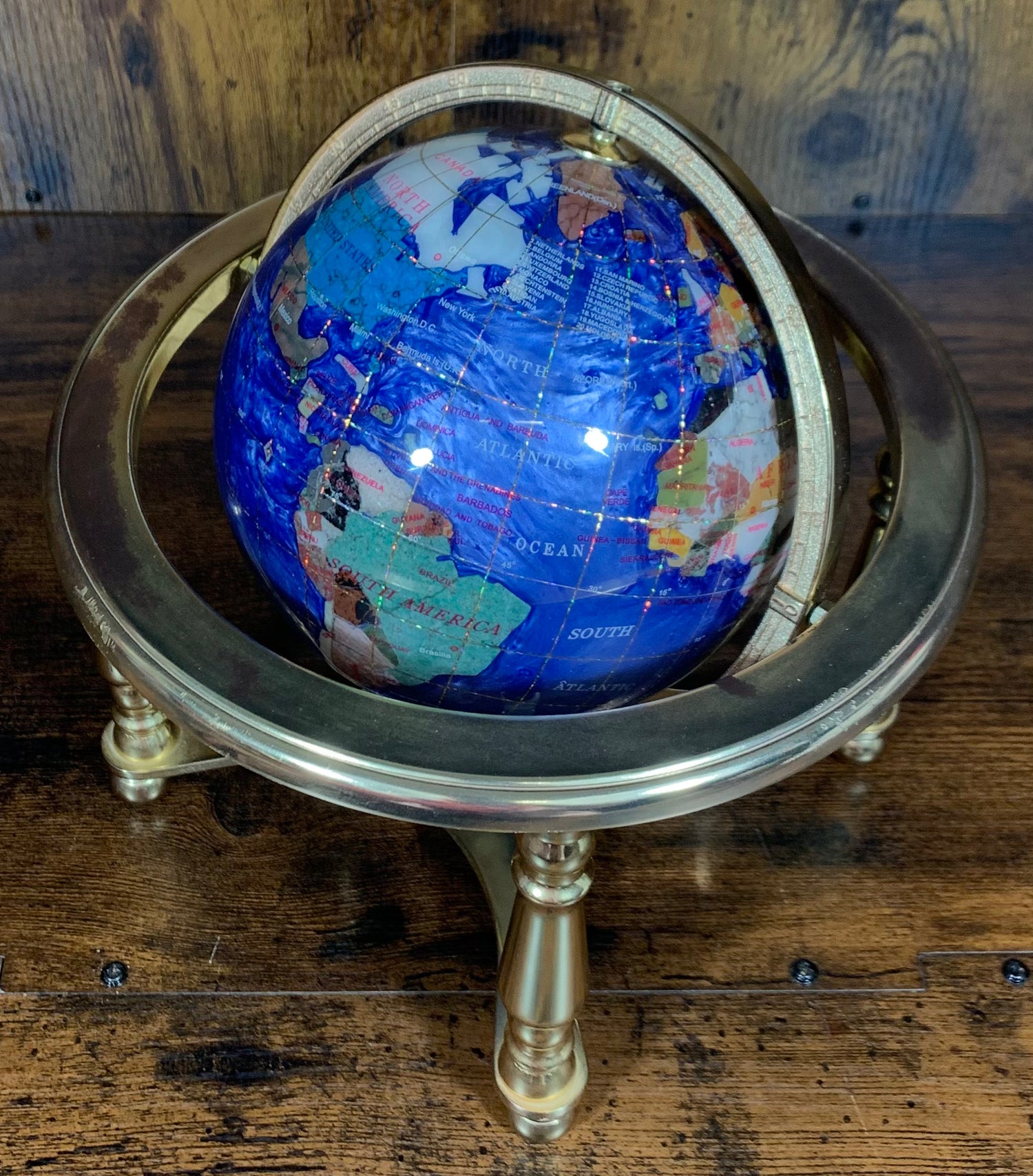 Dark Blue Gemstone Globe With Metallic Brass Cradle - Swirl Pattern