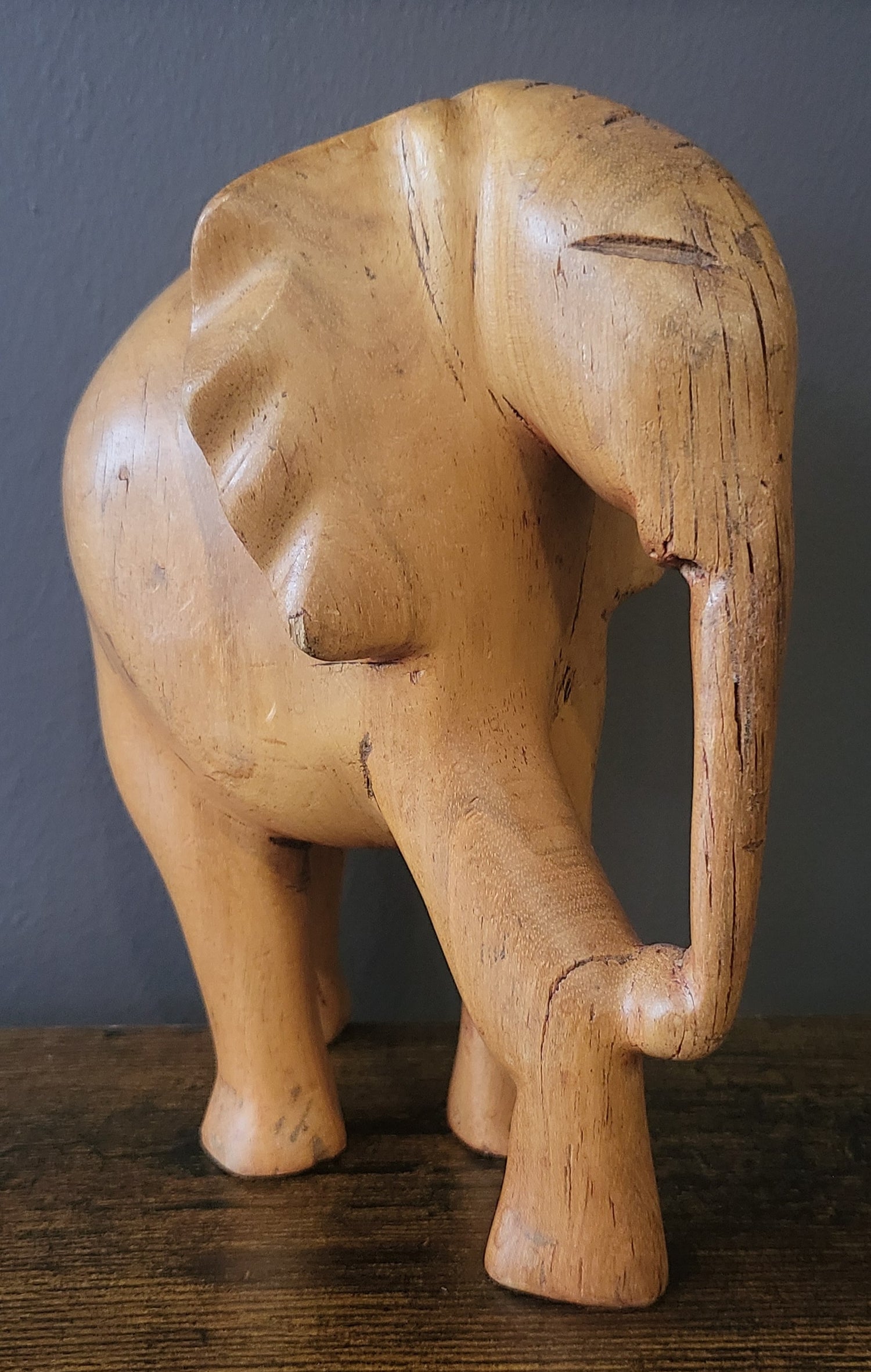 Wooden Standing Elephant without Tusks and Trunk Down