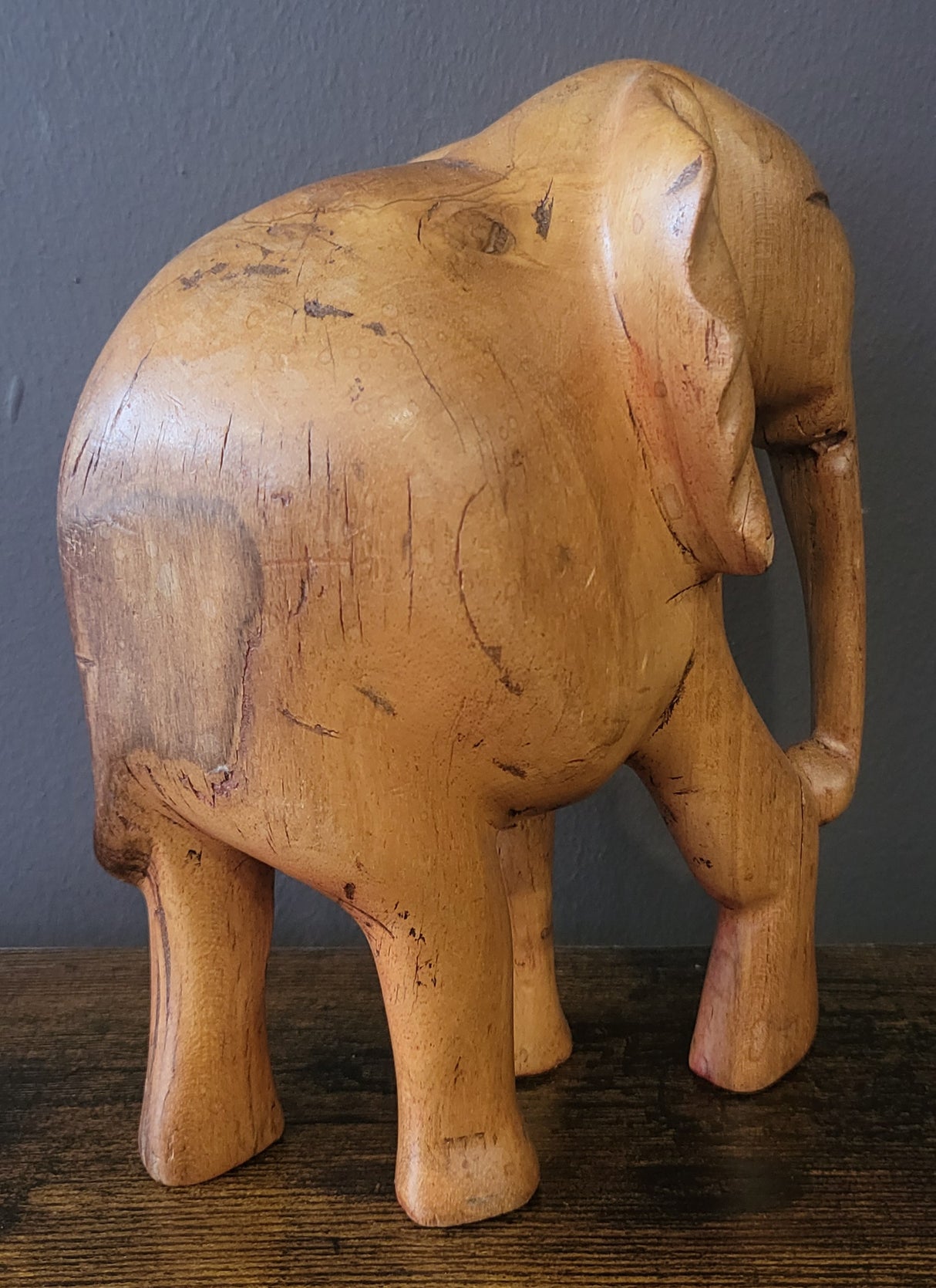 Wooden Standing Elephant without Tusks and Trunk Down