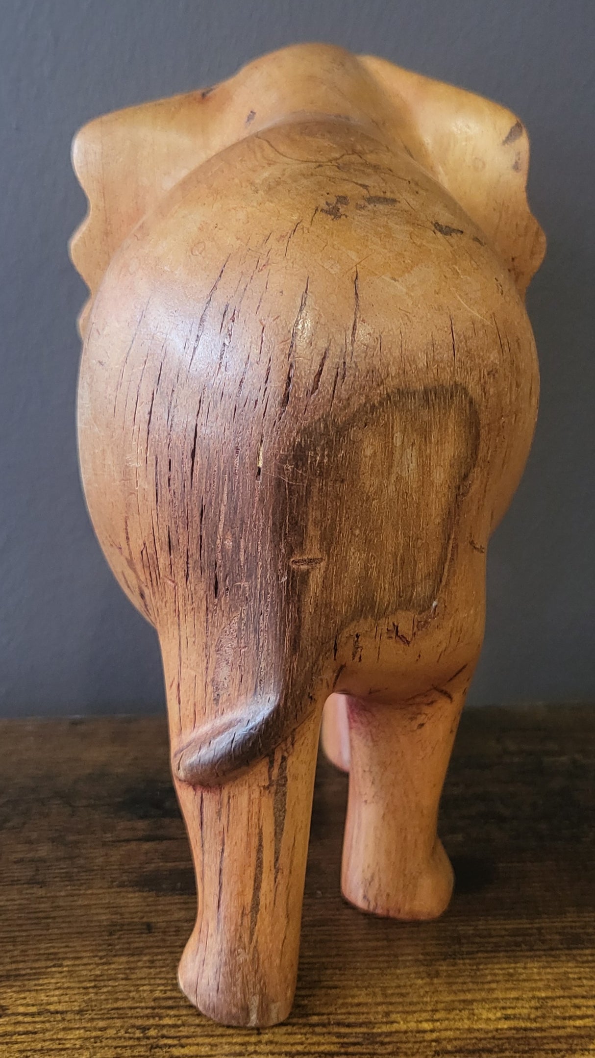 Wooden Standing Elephant without Tusks and Trunk Down
