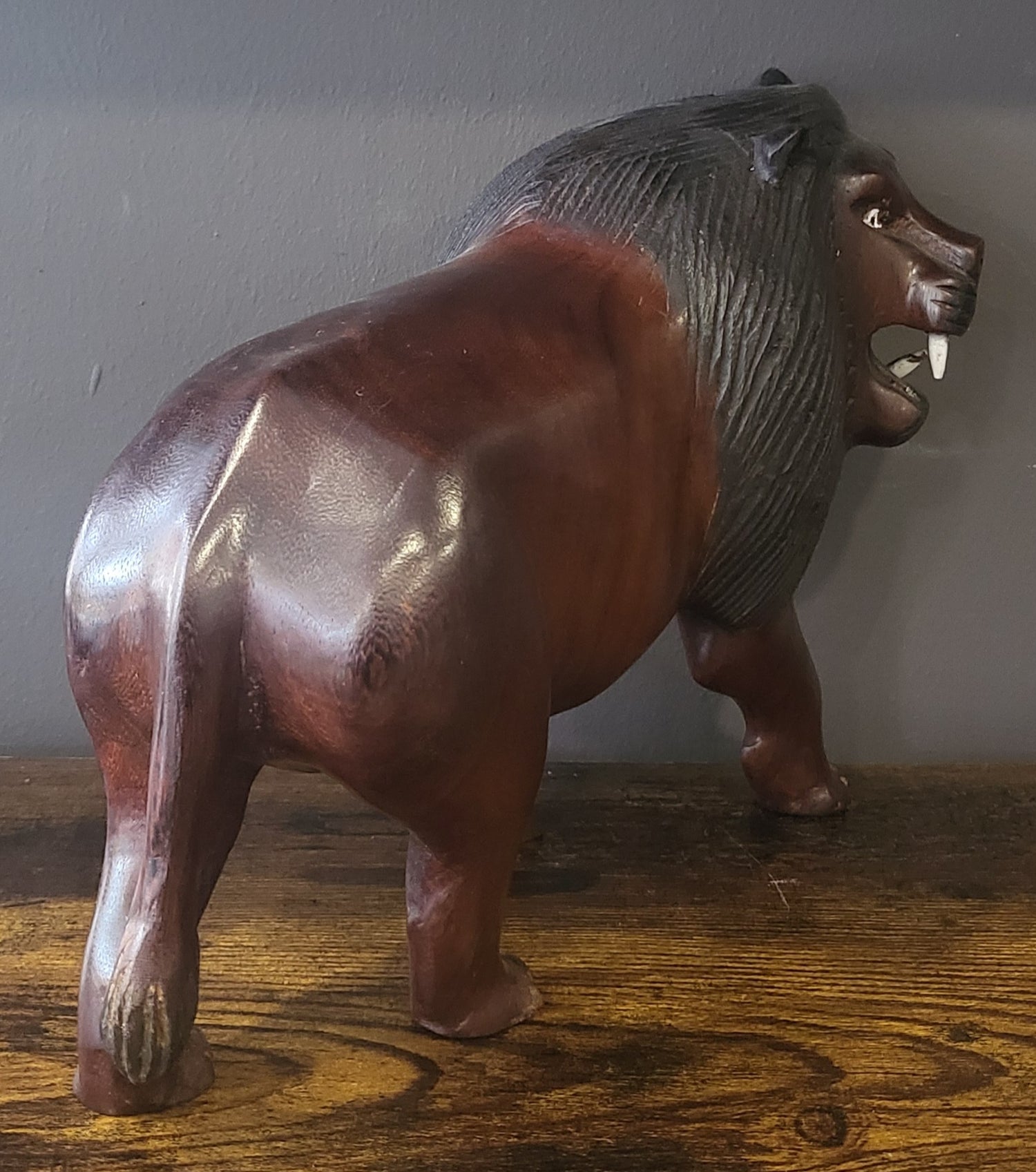 Ebony Head Turned Lion with Textured Mane