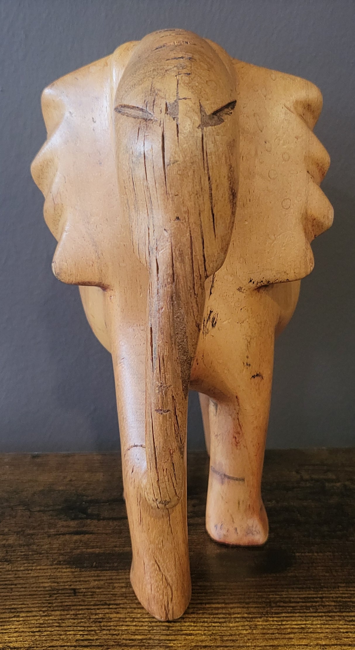 Wooden Standing Elephant without Tusks and Trunk Down