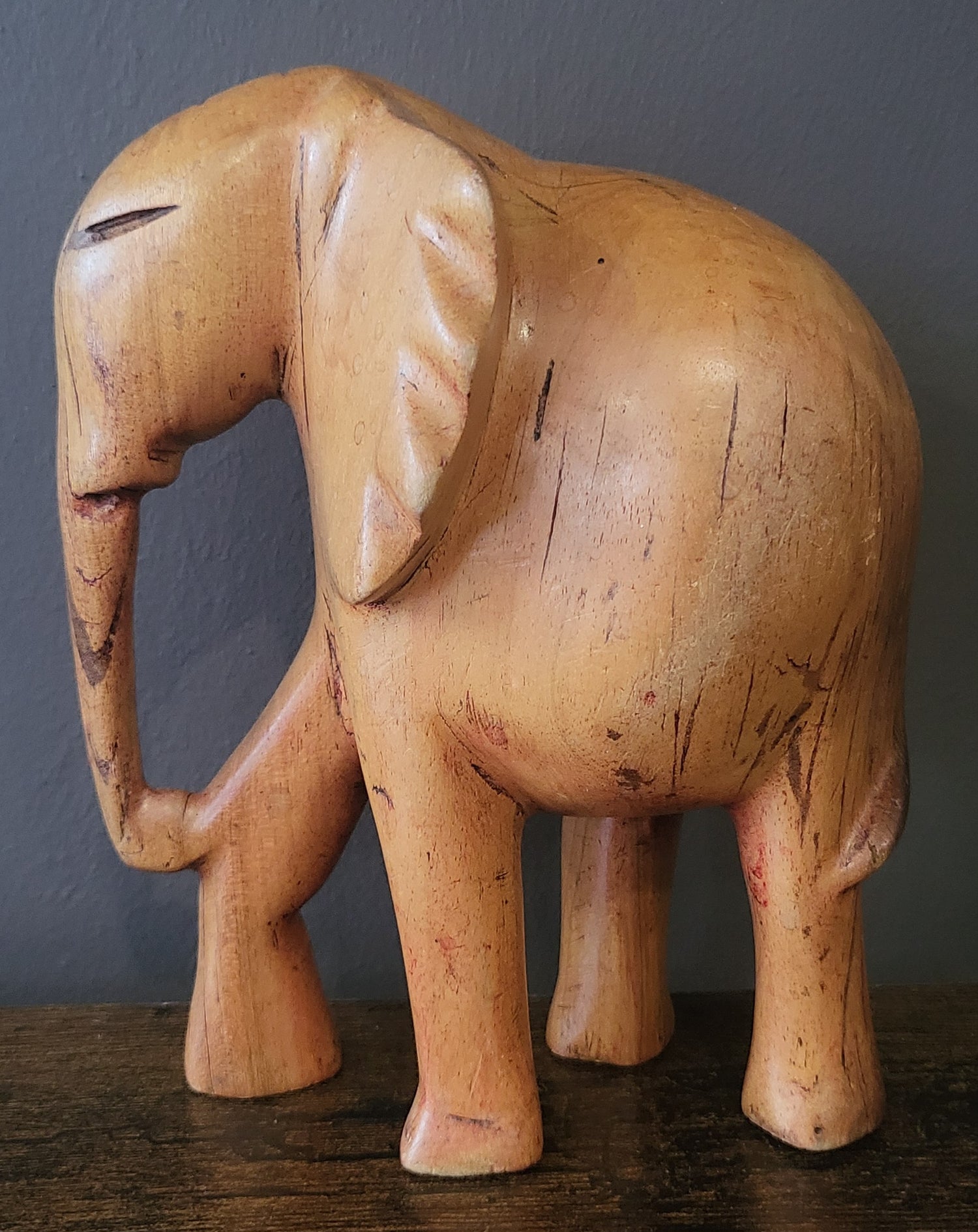 Wooden Standing Elephant without Tusks and Trunk Down