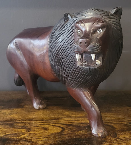 Ebony Head Turned Lion with Textured Mane
