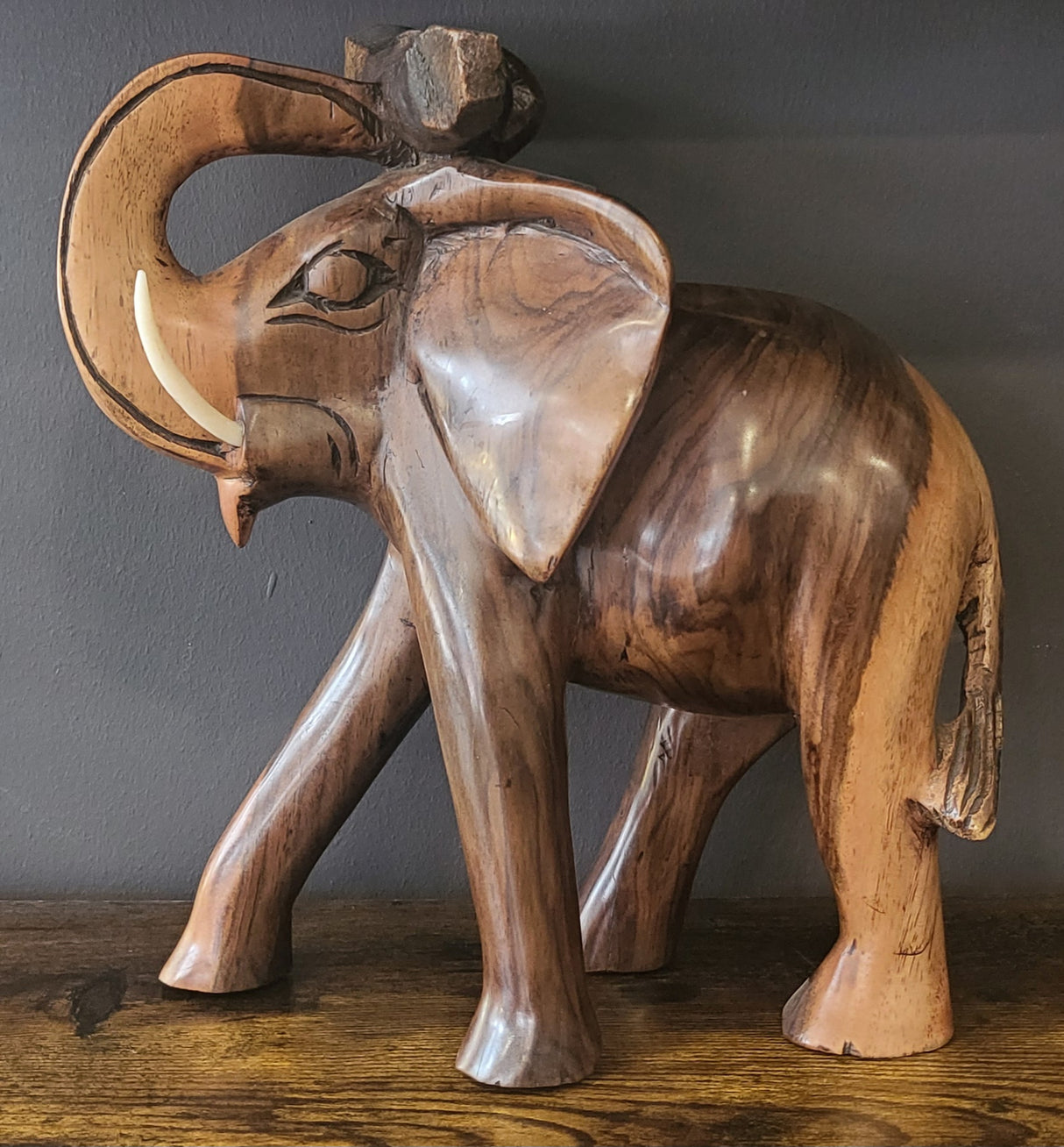 Mahogany Elephant Holding Tree Log from Trunk