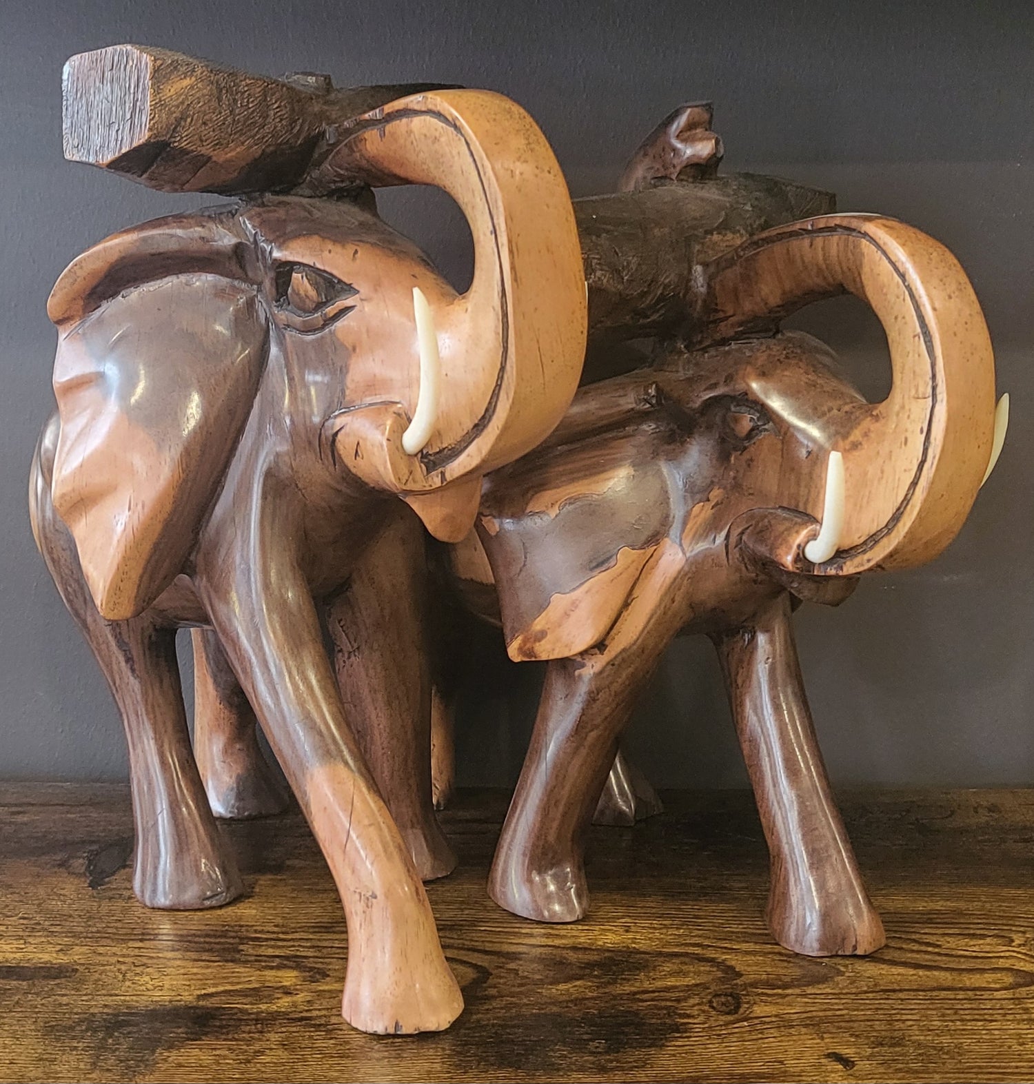 Mahogany Elephant Holding Tree Log from Trunk
