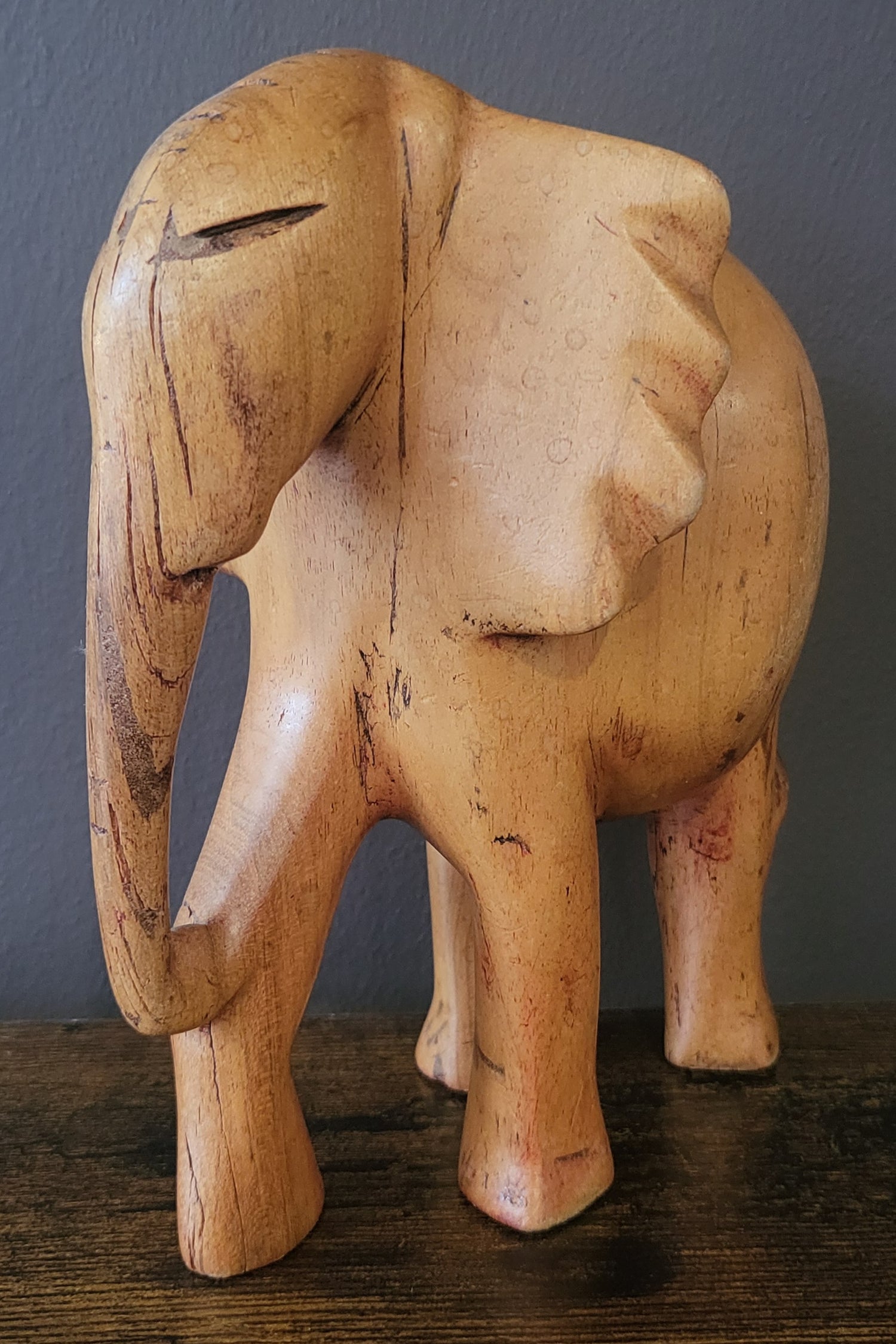Wooden Standing Elephant without Tusks and Trunk Down