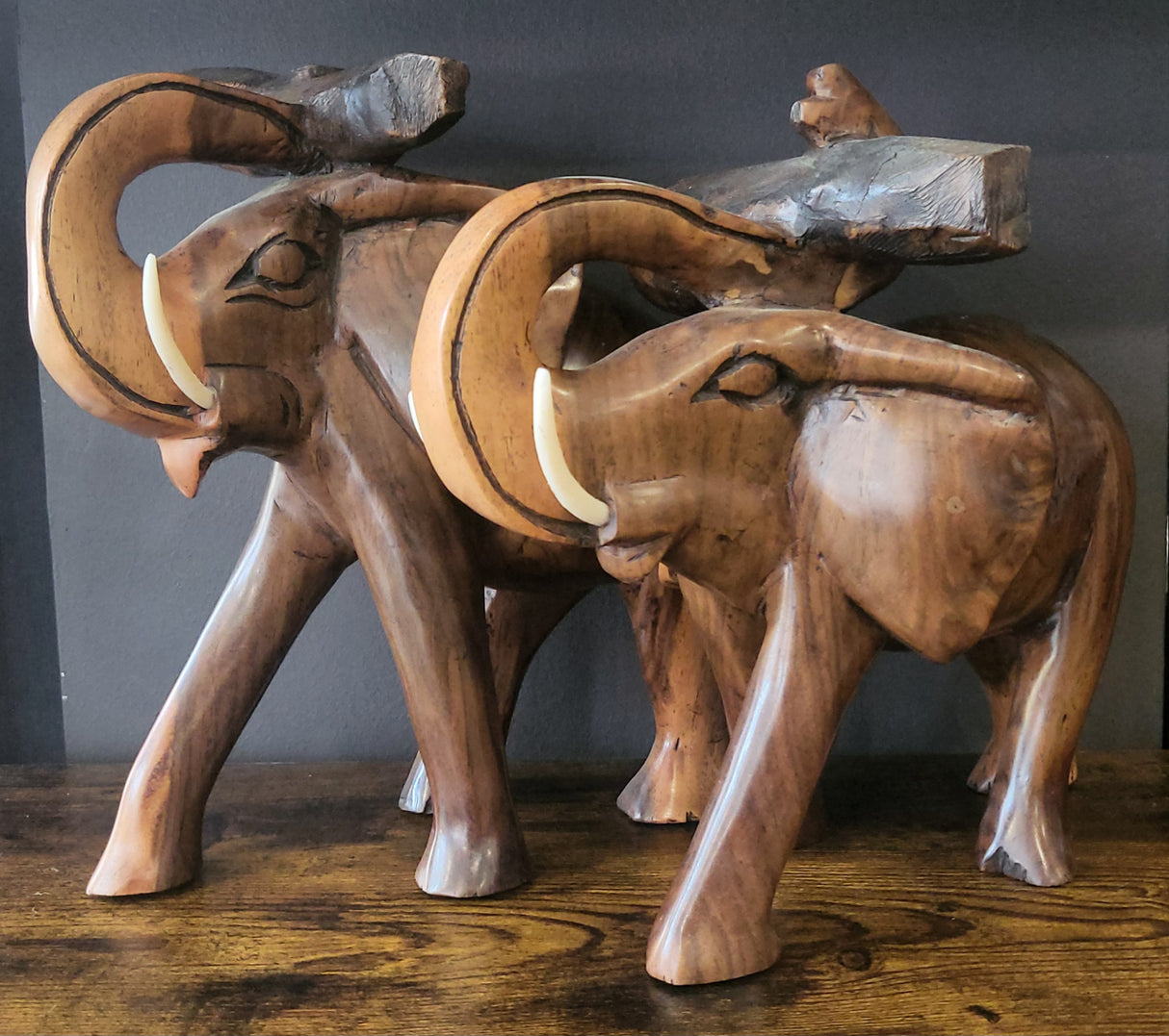Mahogany Elephant Holding Tree Log from Trunk