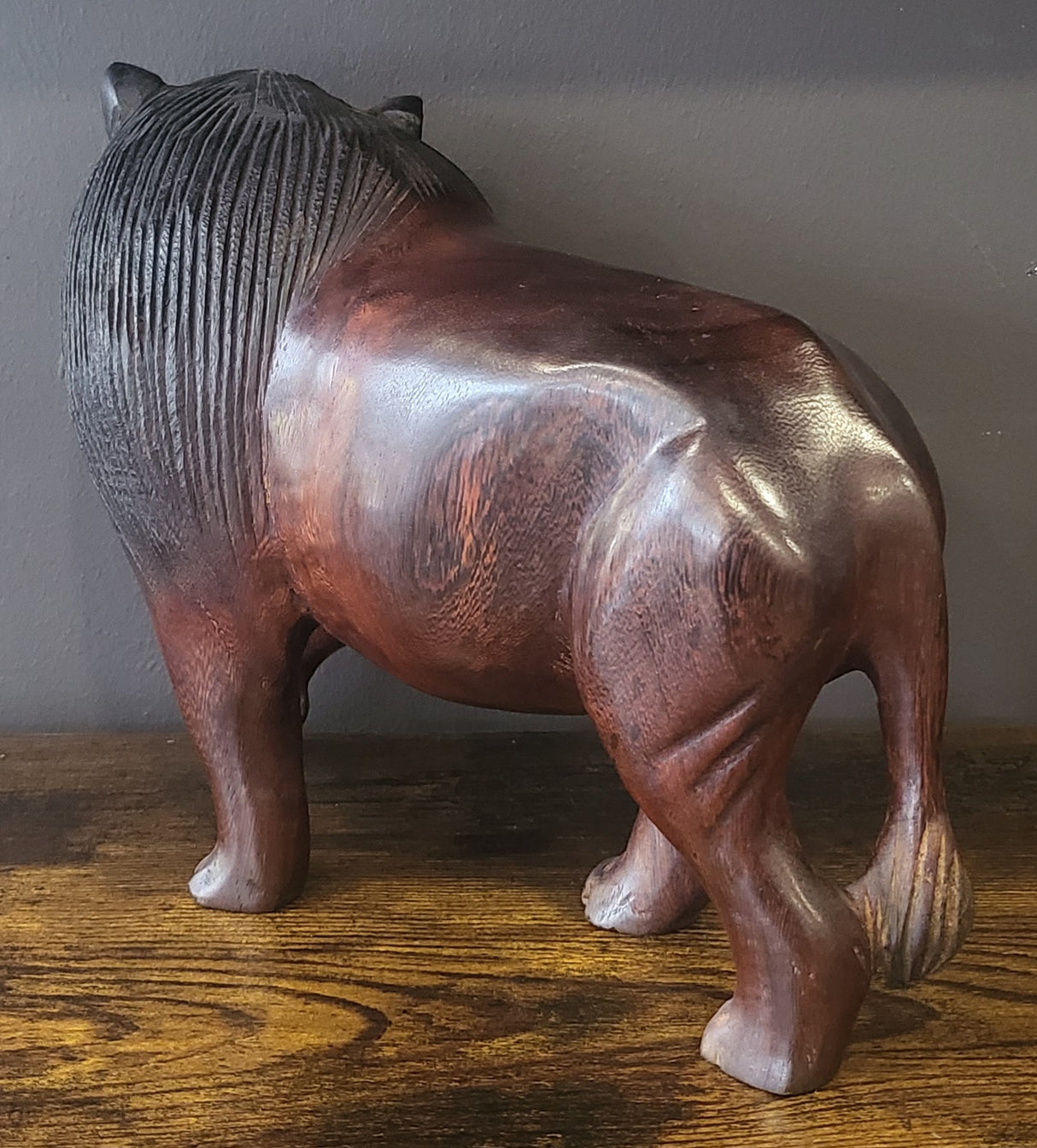 Ebony Head Turned Lion with Textured Mane