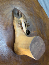 Carved Sculpture of a Mosquito Biting on a Foot
