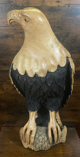 Beautifully Carved Bald Eagle Perched on Stone with a Trapped Fish