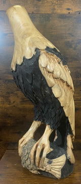 Beautifully Carved Bald Eagle Perched on Stone with a Trapped Fish