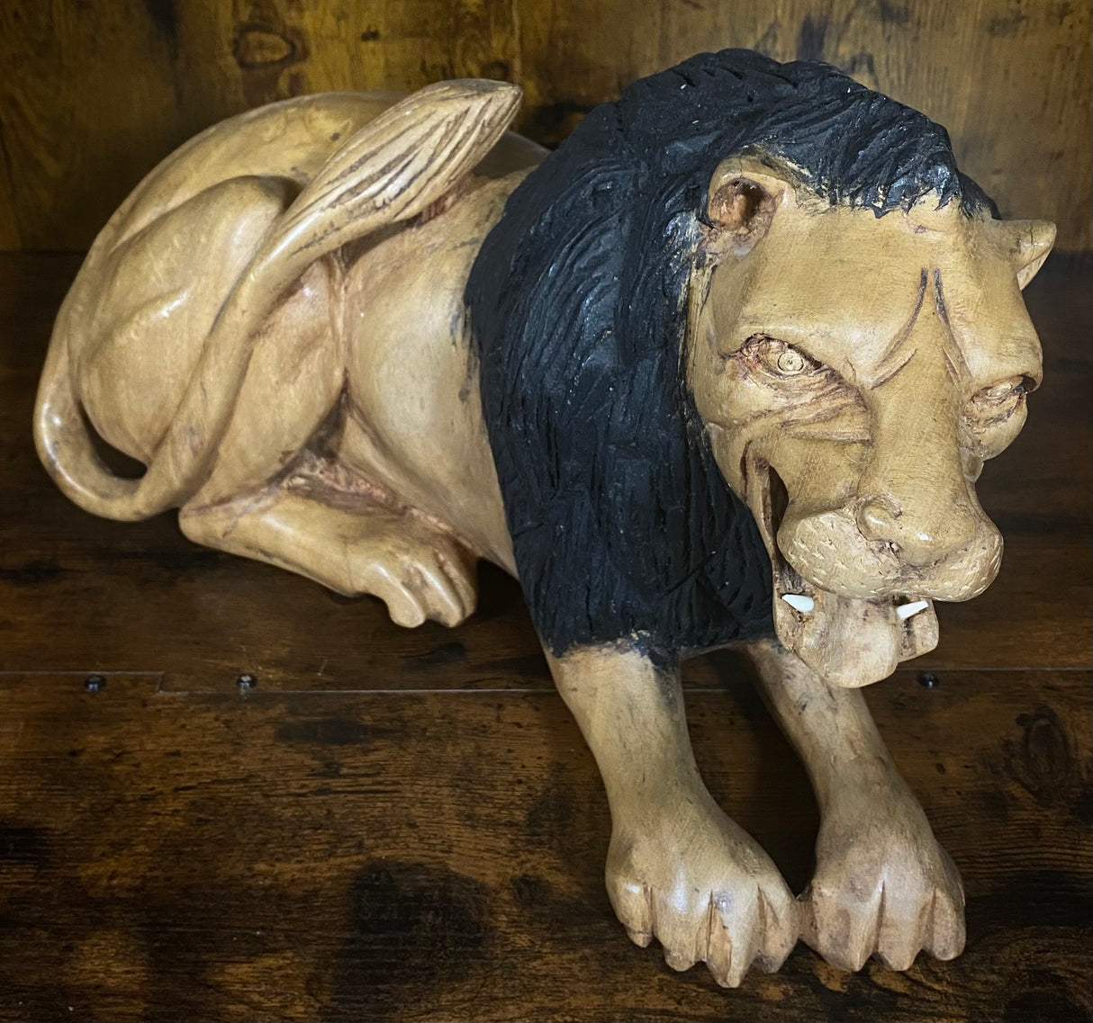 Hand Carved Resting Lion with a Warning Growl