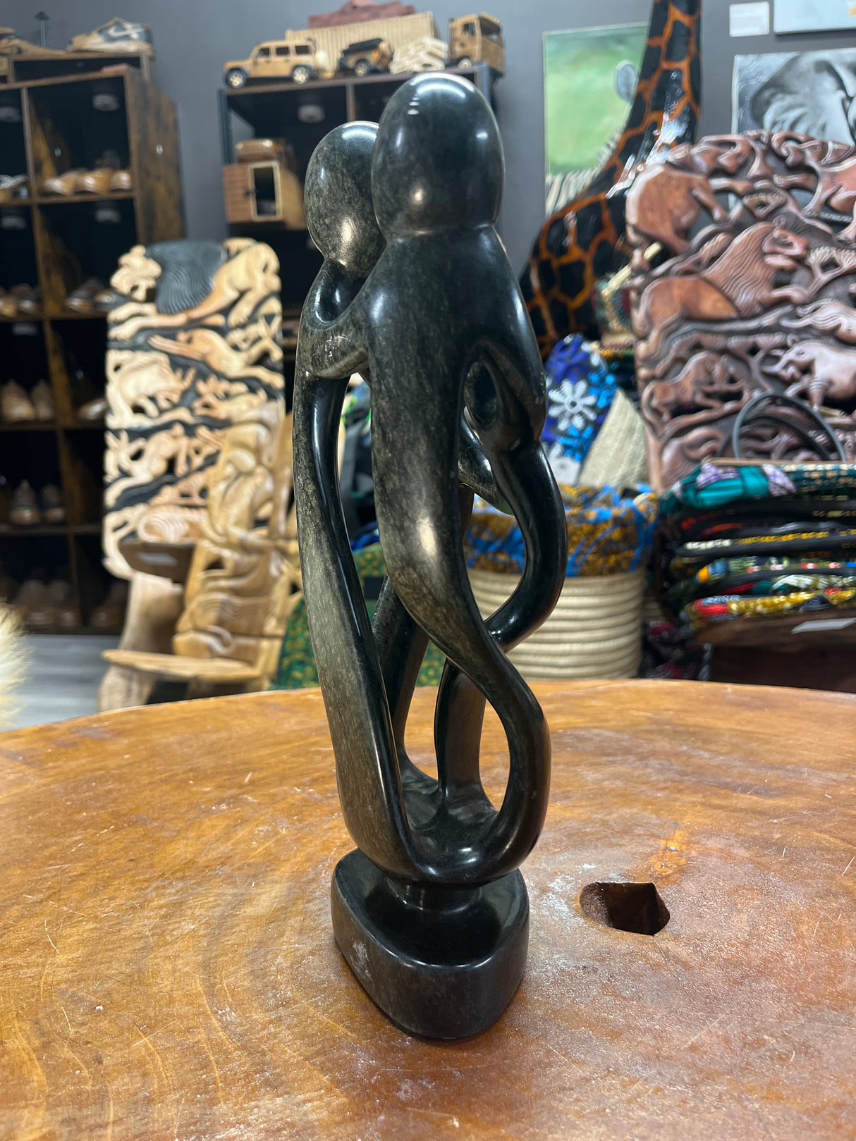 Hand Carved Stunning Green Stone Abstract Sculpture - Parents and Two Children (Dark - Wide)