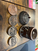 Hand Carved Ebony African Hut with Rhino and Elephant Design Coaster Set with 4 Coasters