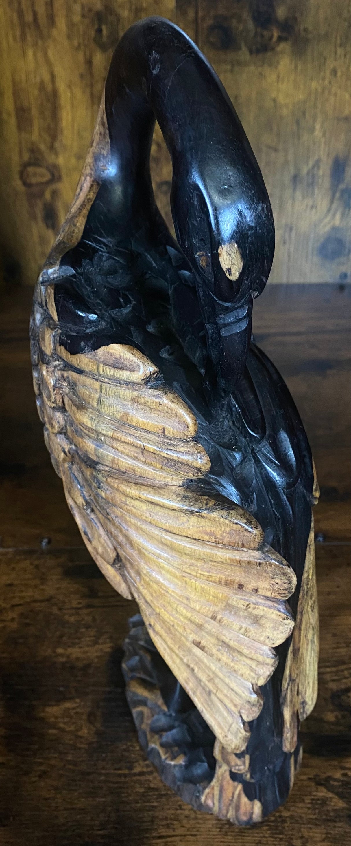 Hand Carved Stressed Bird Plucking Feathers from its Back