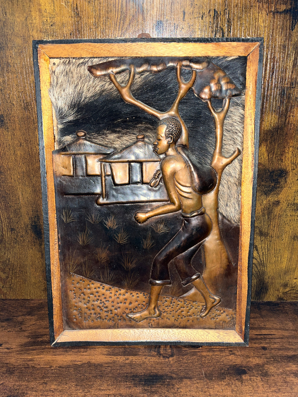 Hammered Copper Working Man With Fur