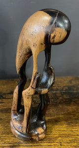 Wooden Mother Breaking Up a Fight Between Siblings